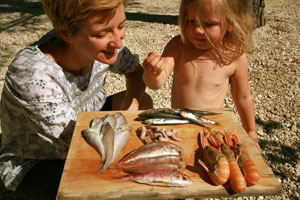 Cathy teaching Rosie about seafood.